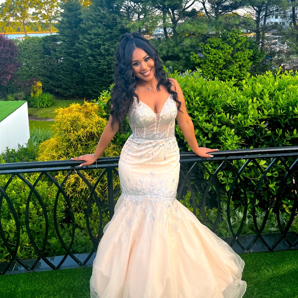 Beautiful ivory/champagne colored prom dress. Used.